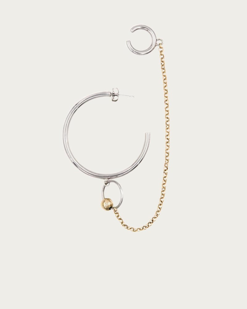 Front of a size O/S Nicky Earring With Ear Cuff in Silver/Pale Gold in Silver/Pale Gold by JUSTINE CLENQUET. | dia_product_style_image_id:329651
